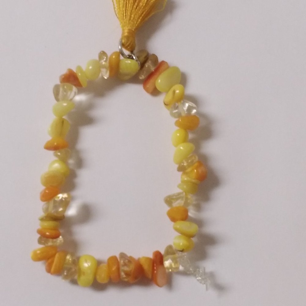 Yellow, orange, clear with yellow tassel homemade bracelet💛
